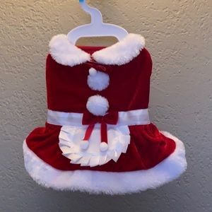 Mrs. Claus dress with two hair bows.
